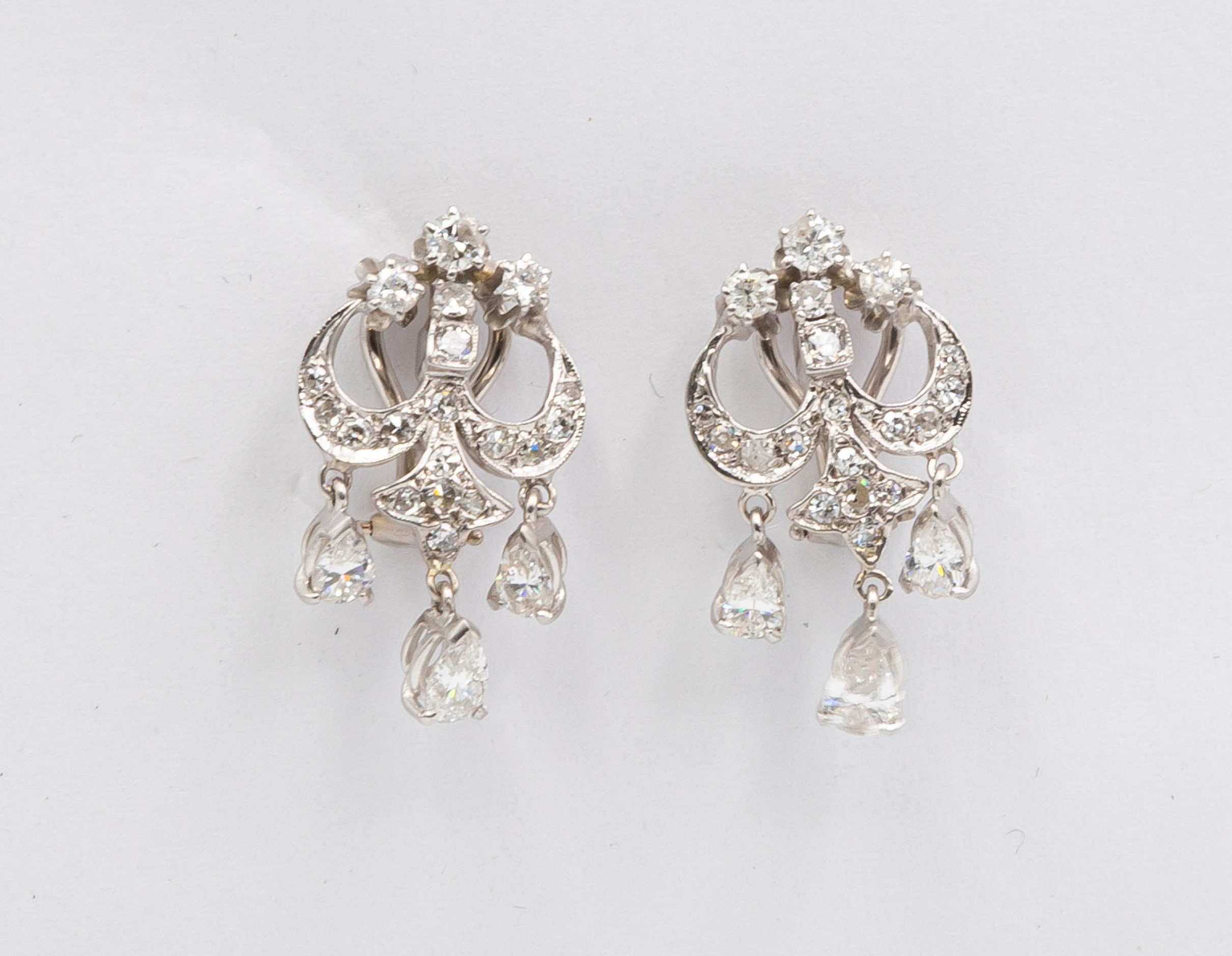 Appraisal: K GOLD AND DIAMOND EARRINGS A pair of kt white