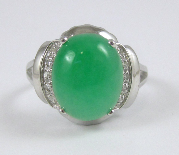 Appraisal: JADE DIAMOND AND FOURTEEN KARAT GOLD RING The white gold