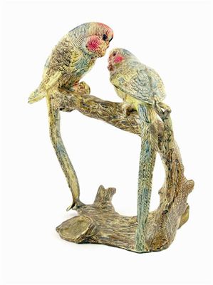 Appraisal: A cold painted bronze group of two parakeets on a