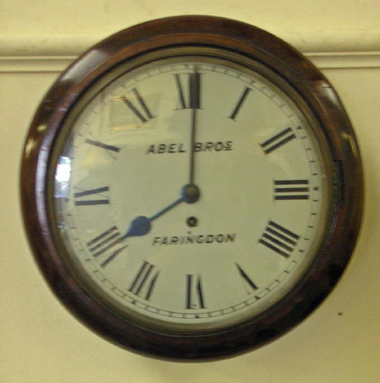 Appraisal: A Victorian circular wall clock in mahogany case by Able