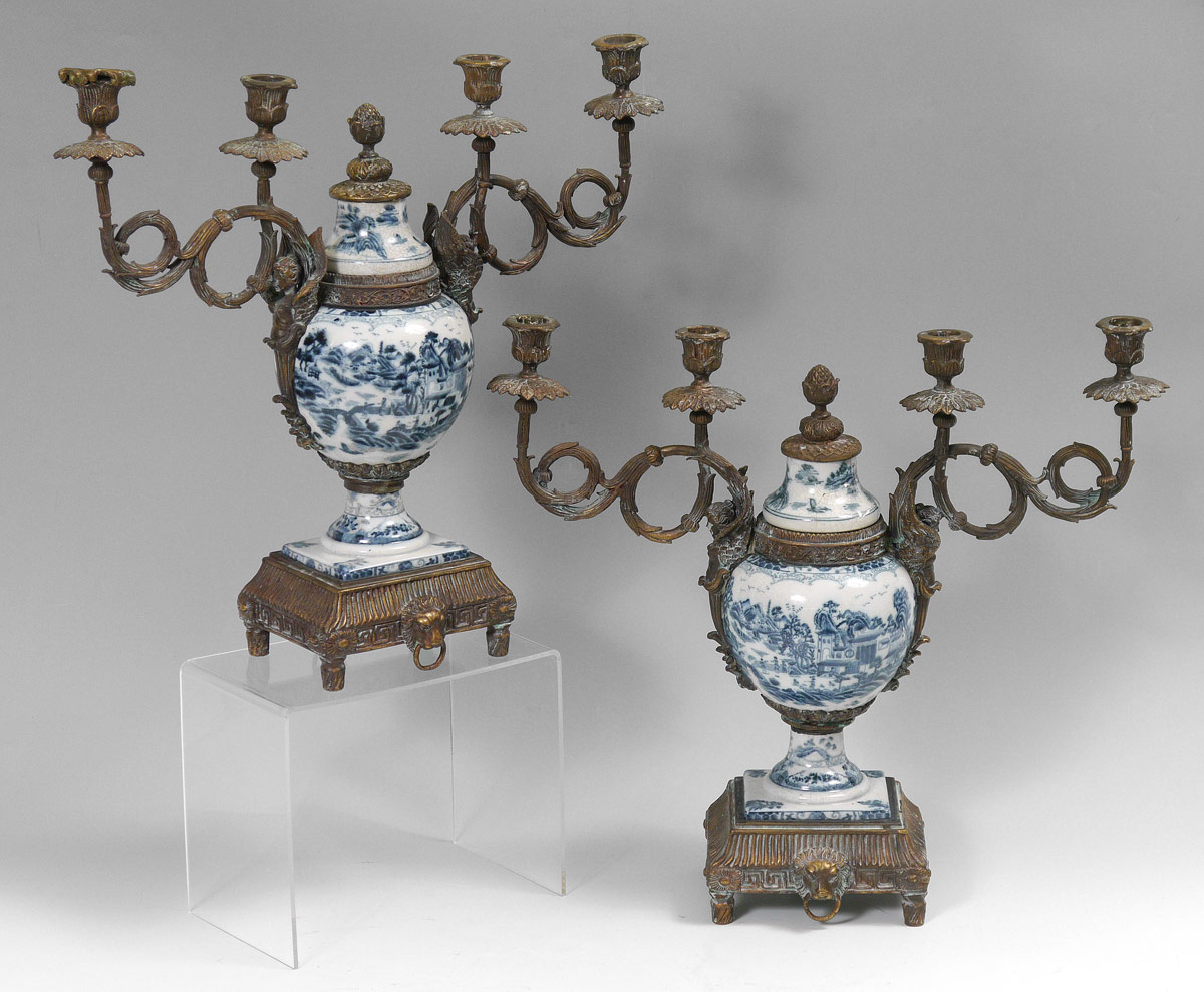 Appraisal: PAIR CASTILIAN LIGHT CANDELABRA Metal mounted Castilian porcelain covered urns