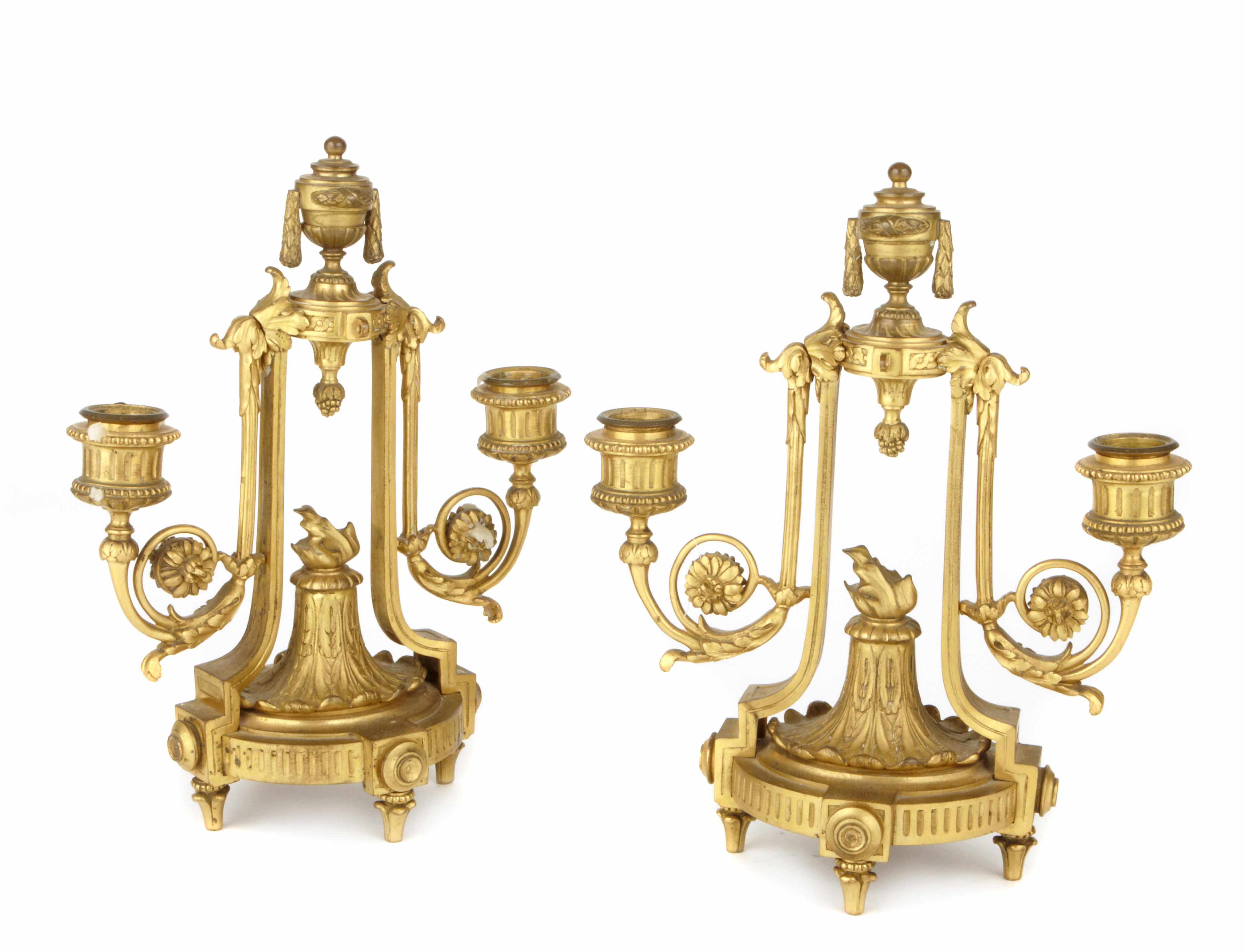 Appraisal: A pair of Louis XVI style gilt bronze two light