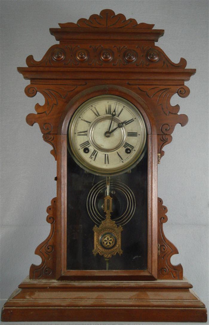 Appraisal: Unmarked walnut mantle clock t s runs strikes nice pendulum