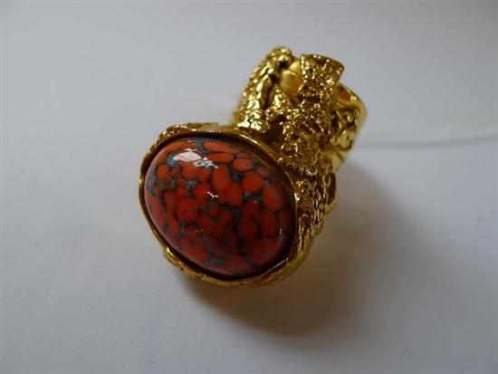 Appraisal: A GEM SET ABSTRACT RING BY YVES SAINT LAURENT