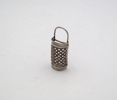 Appraisal: A miniature silver tobacco rasp possibly marked with a control