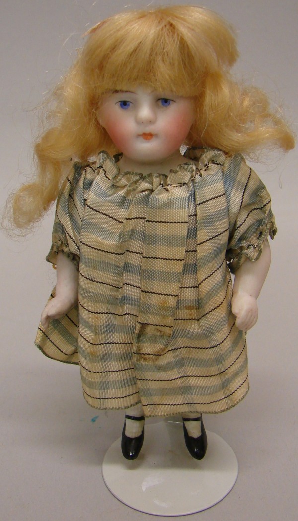 Appraisal: German doll with painted features closed mouth original blonde mohair