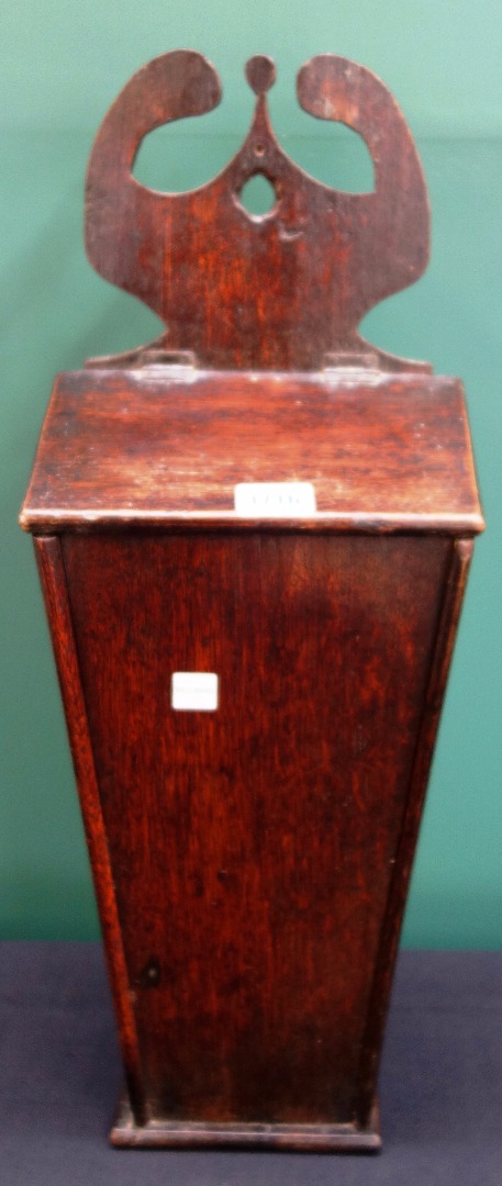 Appraisal: A George III oak hanging candle box with fret carved