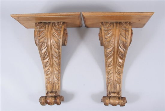 Appraisal: PAIR CARVED WOOD BRACKETS th century Volute scroll with acanthus