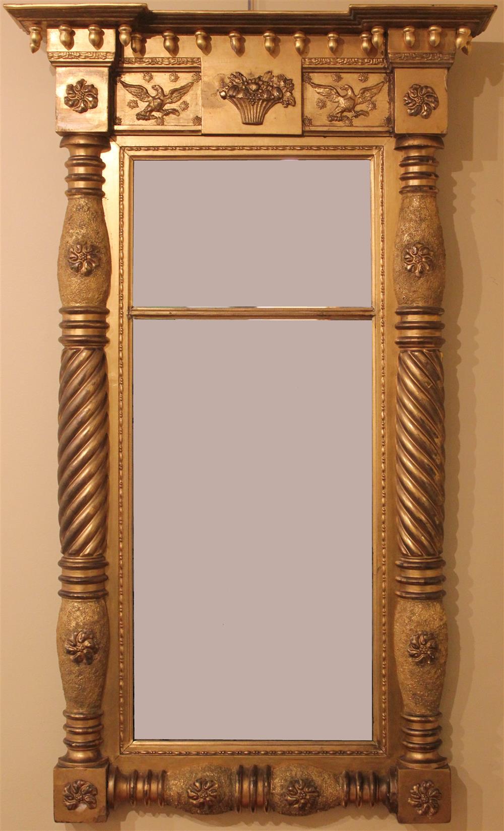 Appraisal: AMERICAN CLASSICAL GILTWOOD PIER MIRROR having an overhanging and molded