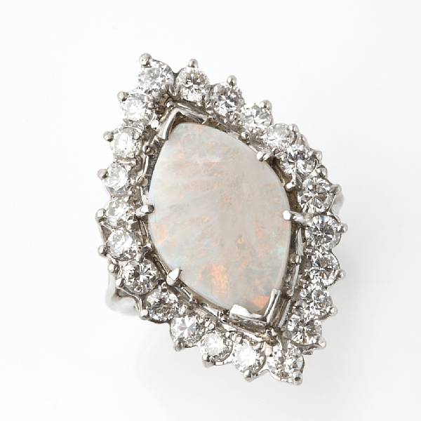 Appraisal: An opal diamond and platinum ring estimated total diamond weight