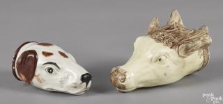 Appraisal: Two Staffordshire stirrup cups th c of a hound and