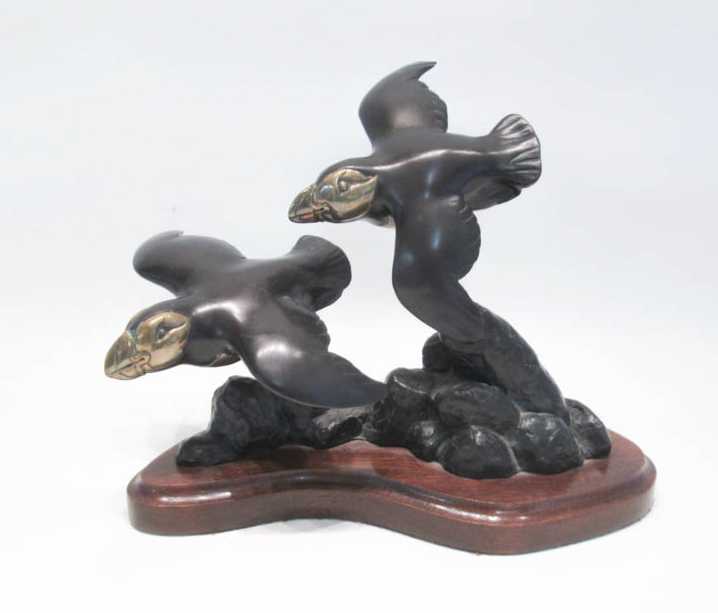 Appraisal: MARY REGAT BRONZE SCULPTURE Alaska Minnesota born Two puffins in