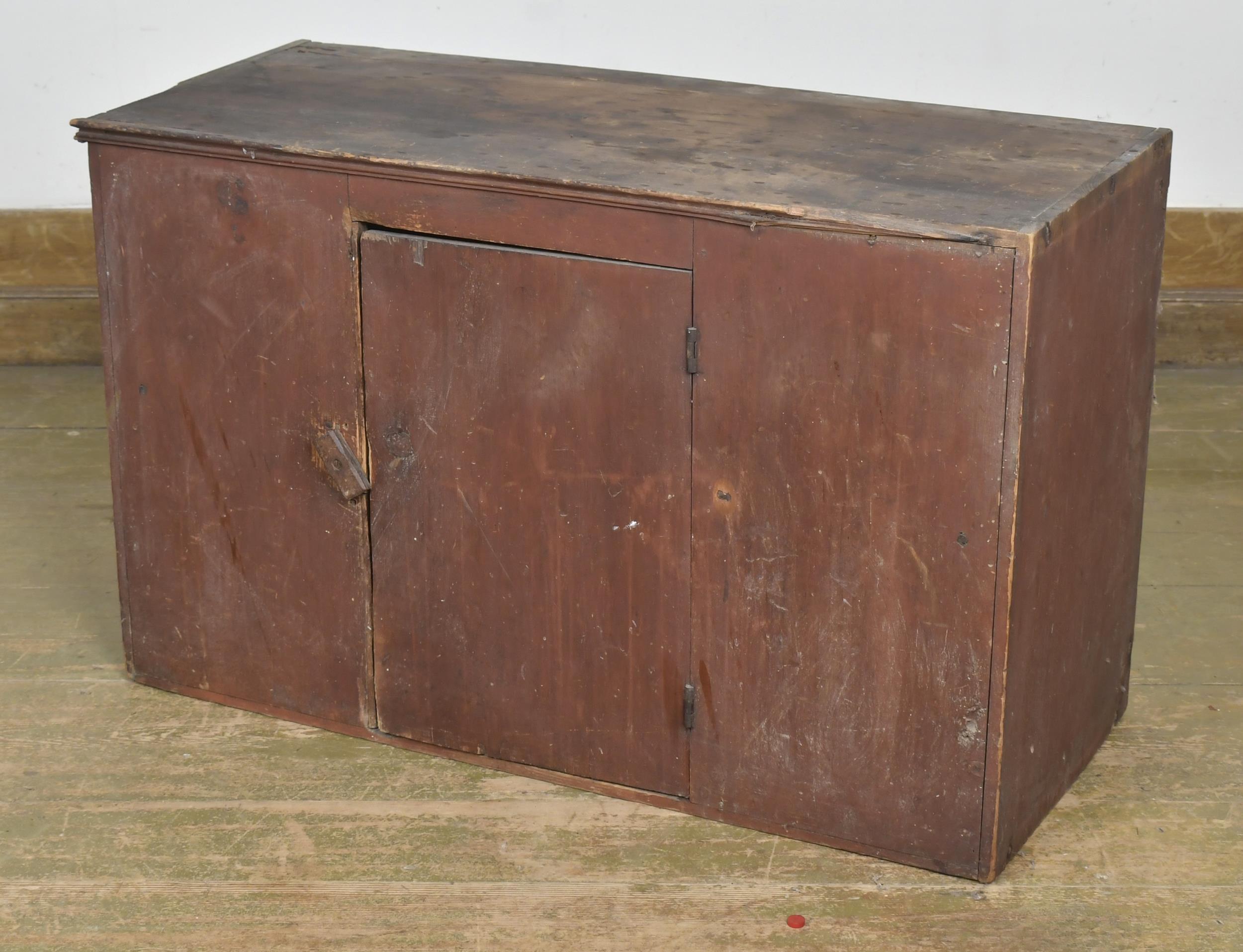 Appraisal: TH C RED PAINTED WALL CUPBOARD Small hanging wall cupboard