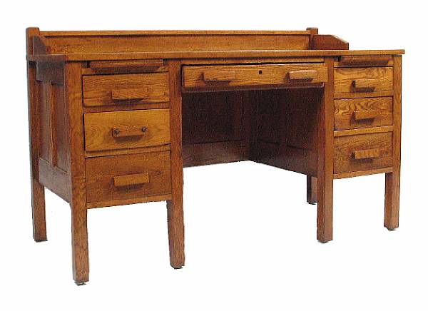 Appraisal: An oak desk and chair