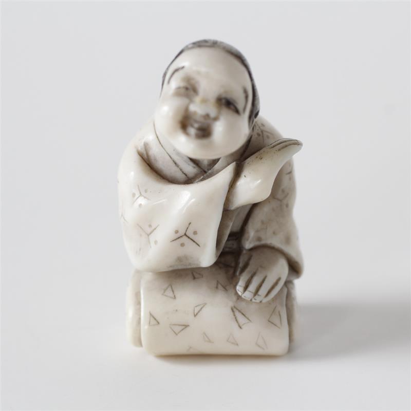 Appraisal: Japanese carved ivory mechanical netsuke figure with movable bobble head