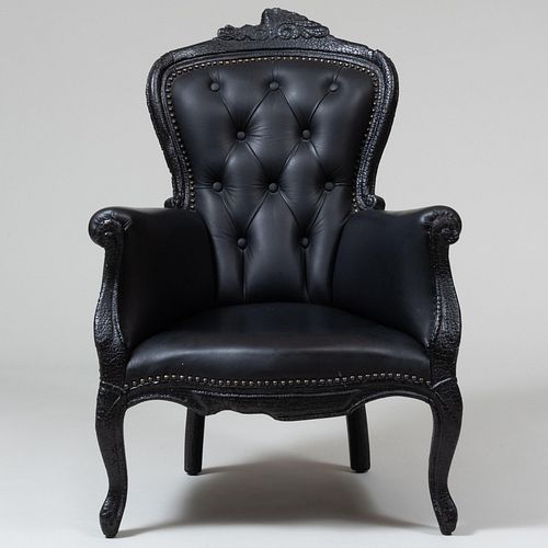 Appraisal: MOOOI SMOKE PITCH BLACK ARMCHAIR UPHOLSTERY BY MAARTEN BAAS x