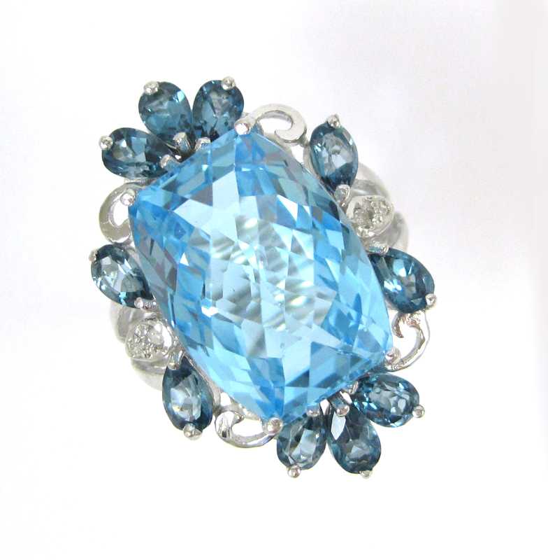 Appraisal: BLUE TOPAZ DIAMOND AND WHITE GOLD RING The k white