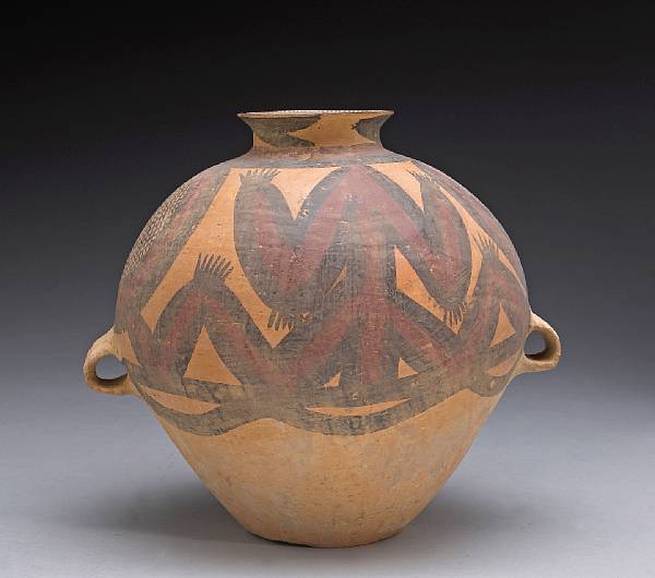 Appraisal: A Chinese Neolithic red painted pottery jar Carefully formed with