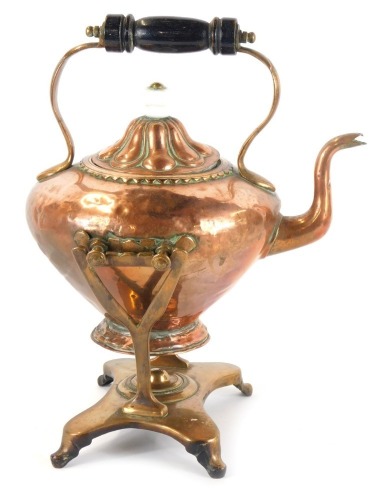 Appraisal: A Victorian copper kettle on stand the fluted top with