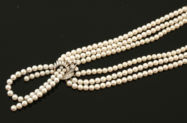 Appraisal: A cultured pearl and diamond necklace The central ct white