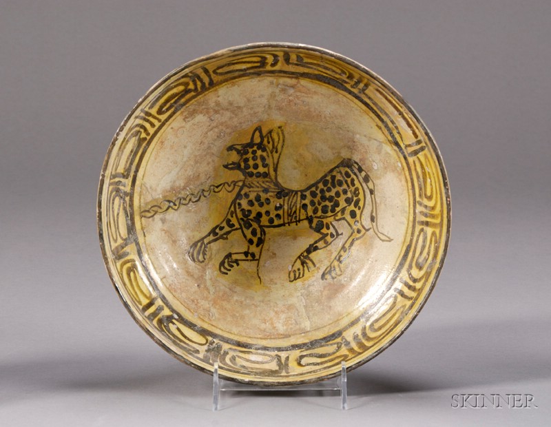 Appraisal: Pottery Bowl Persia Nishapur th century yellow glaze with a