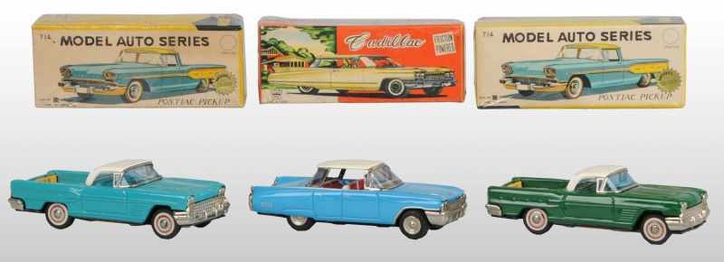 Appraisal: Lot of Tin Automobile Friction Toys Description Japanese Working Includes