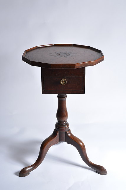 Appraisal: A George III oak occasional tablehaving a twelve sided tray