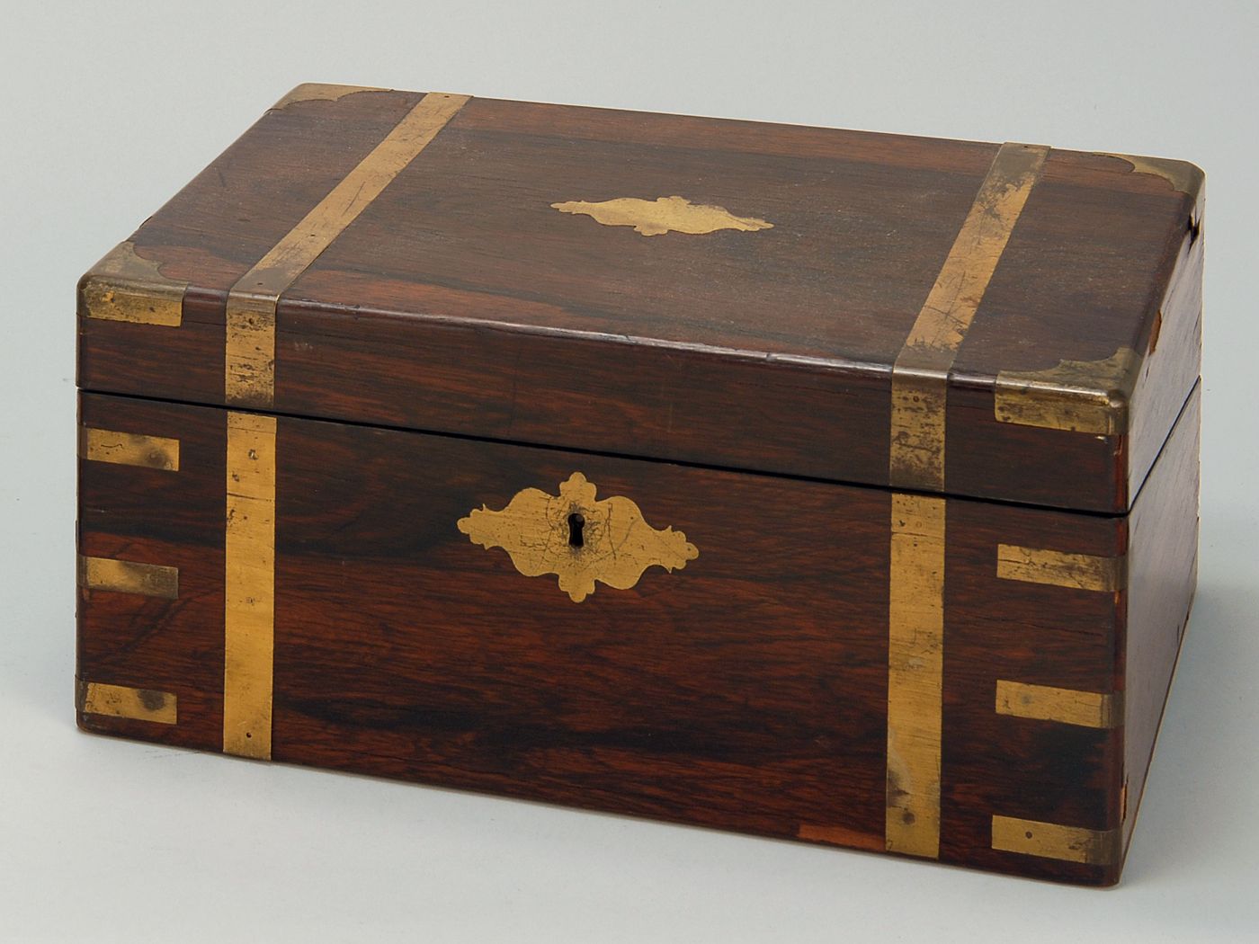 Appraisal: BRASS-BOUND LAP DESK Englsih Mid- th CenturyIn rosewood veneers Original