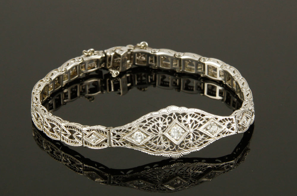 Appraisal: A - K Gold and Diamond Filigree Bracelet K white