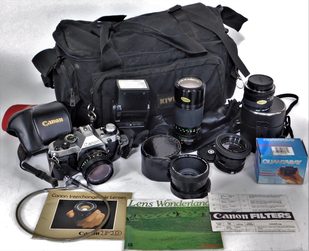 Appraisal: CANON AE- CAMERA WITH BAG AND ACCESSORIES Canon AE- mm