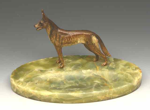 Appraisal: A 'S ONYX AND COLD PAINTED LETTER HOLDER with alsatian