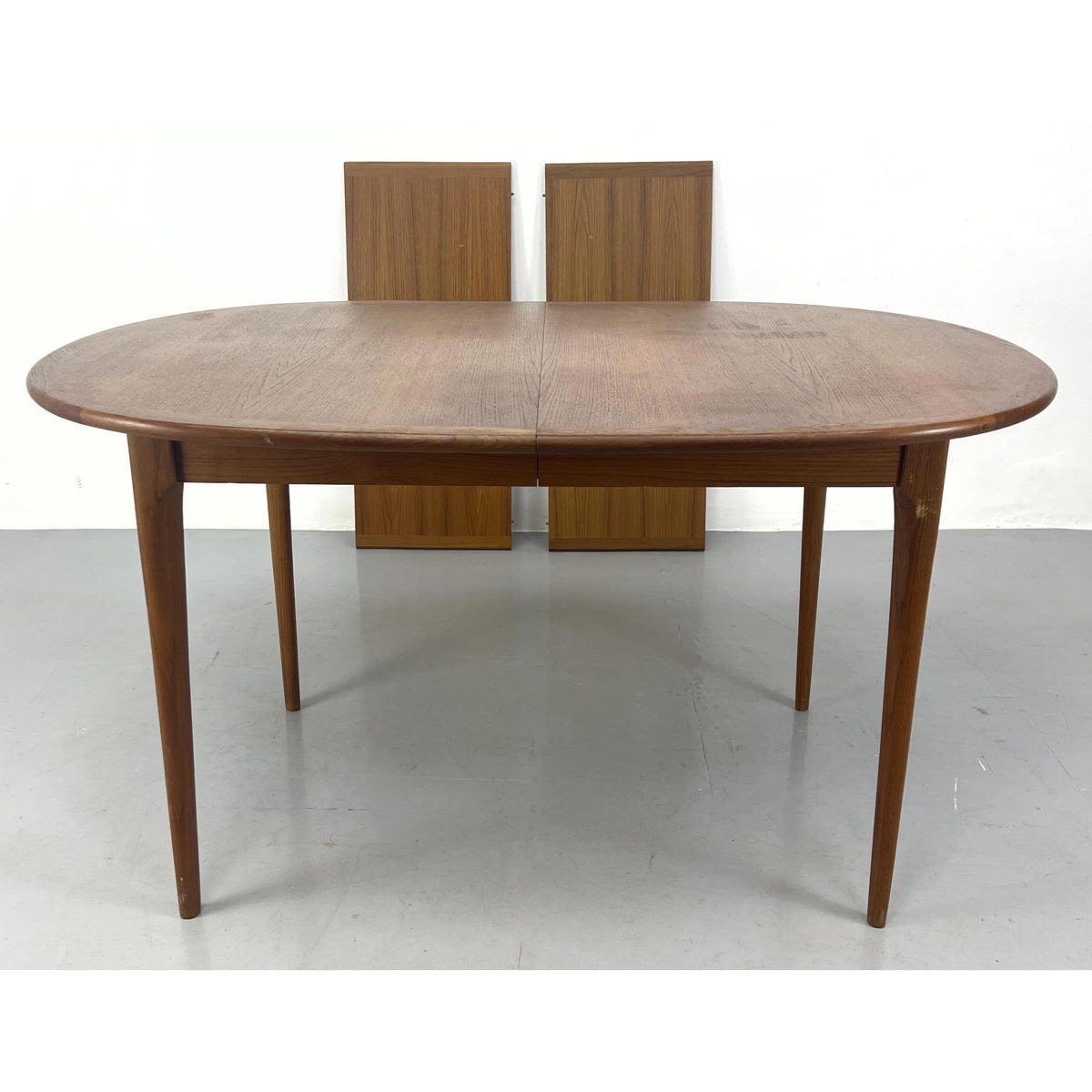 Appraisal: Oval Danish Modern Teak Dining Table Includes - inch leaves