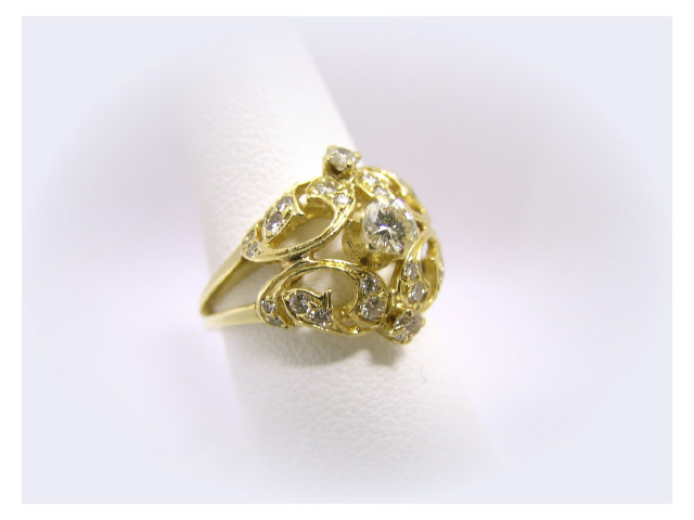 Appraisal: K yellow gold lady's Victorian-style ring set with approximately ct