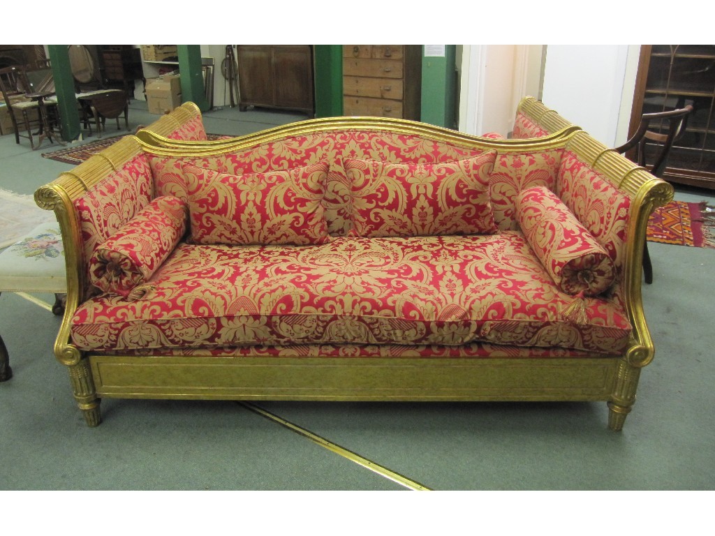 Appraisal: Good reproduction Regency style gilt and damask settee