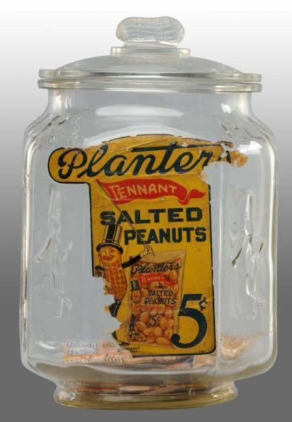 Appraisal: Planters Peanut -Sided Jar with Lid Label Condition Fair