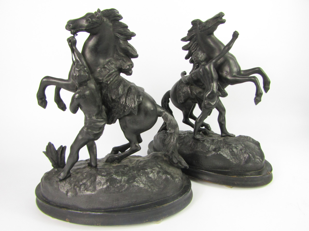 Appraisal: A pair of late thC spelter figures of Marley horses