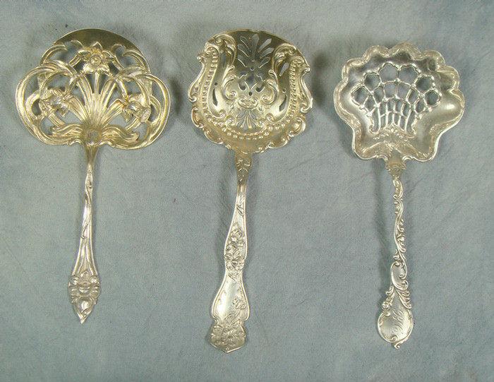 Appraisal: ornate sterling silver bonbon spoons l TO Estimate -