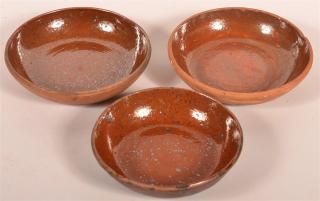 Appraisal: Set of Three PA Redware Glazed Pie Plates Set of