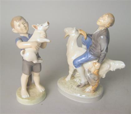 Appraisal: Two Royal Copenhagen porcelain figures The first modeled as a