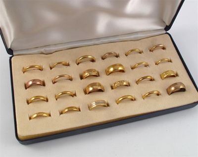 Appraisal: A box containing twenty four assorted gold rings g in