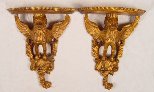 Appraisal: CARVED GILTWOOD FIGURAL GRIFFIN BRACKET SCONCES '' tall '' wide