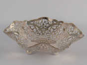 Appraisal: A silver hexagonal shaped and pierced bonbon dish on three