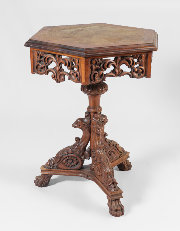 Appraisal: VICTORIAN CARVED SIDE TABLE Hexagonal top with openwork carved foliate