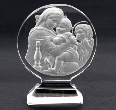 Appraisal: A modern Lalique clear and frosted glass paperweight intaglio cast