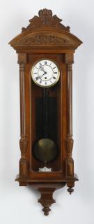 Appraisal: American carved walnut regulator clock Early th century American carved