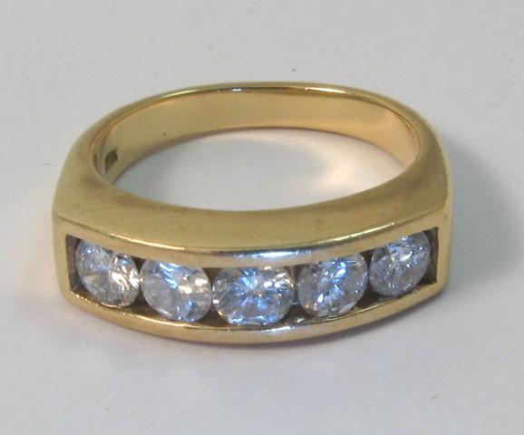 Appraisal: DIAMOND AND FOURTEEN KARAT GOLD RING with appraisal Set with