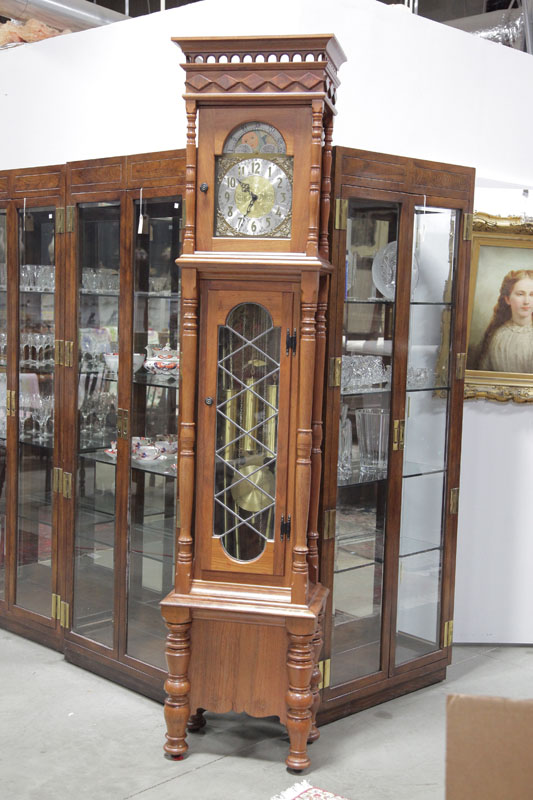 Appraisal: GRANDFATHER CLOCK Brass works and dial walnut case leaded glass