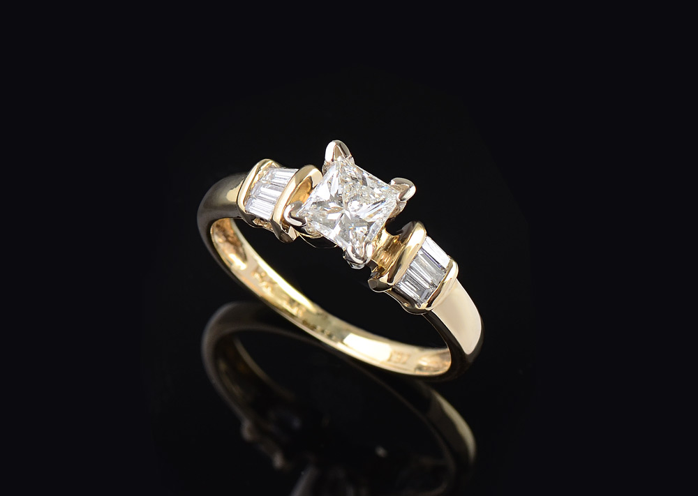 Appraisal: PRINCESS CUT DIAMOND ENGAGEMENT RING K yellow gold ring centers