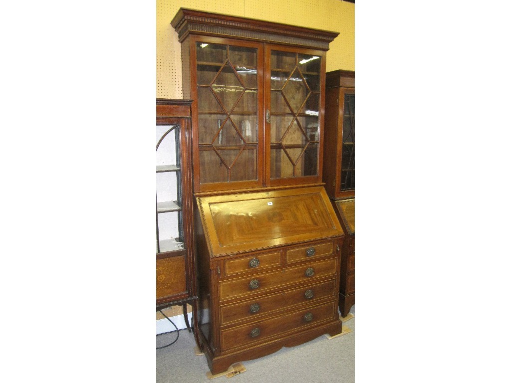 Appraisal: Edwardian mahogany and astragal glazed bureau bookcase