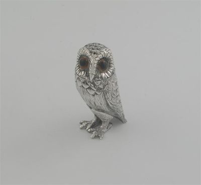 Appraisal: A modern cast model of an owl with textured plumage